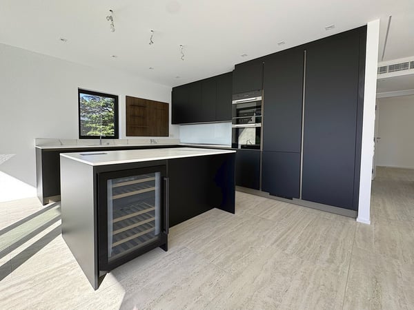 Elegante 1.5 locali al primo piano con terrazza e parziale vista lago 5