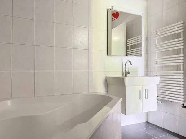 Sonnige 5.5-Zimmer-Eigentumswohnung mit Balkon, Keller und Einstellhallenplatz 10