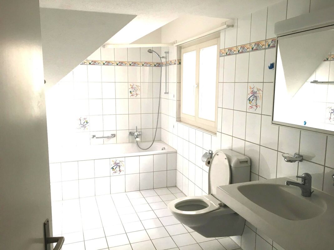 Charmante Maisonettewohnung mit Balkon und Cheminée