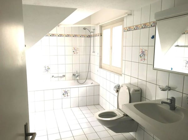 Charmante Maisonettewohnung mit Balkon und Cheminée 4