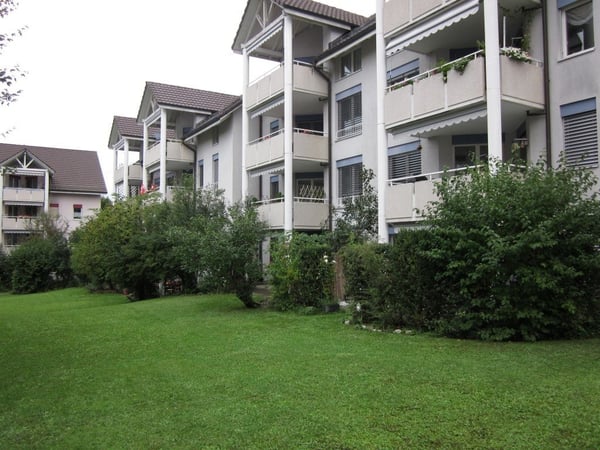 Moderne & grosszügige 4.5 Zimmerwohnung mit Gartensitzplatz 1