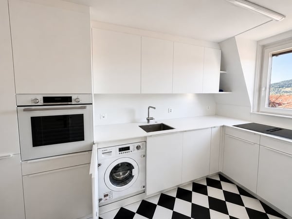 Einzigartige 5.5-Zimmer-Wohnung mit Dachterrasse & grossem Estrich 2