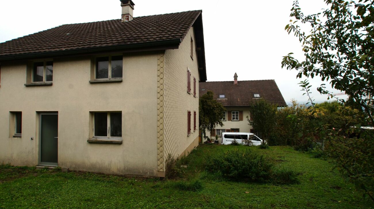 Building land with old property (MFH new building concept study available)