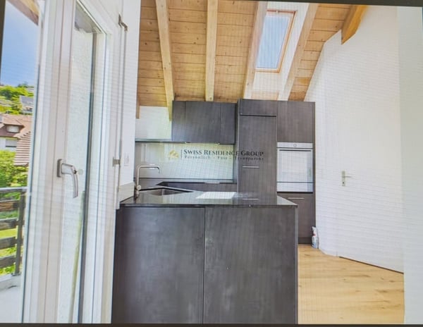 Charmante Dachwohnung mit Cheminée 5