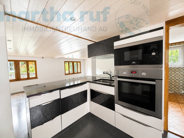Traditionelles, angebautes Einfamilien-Ferienhaus mit alpinem Charm 4