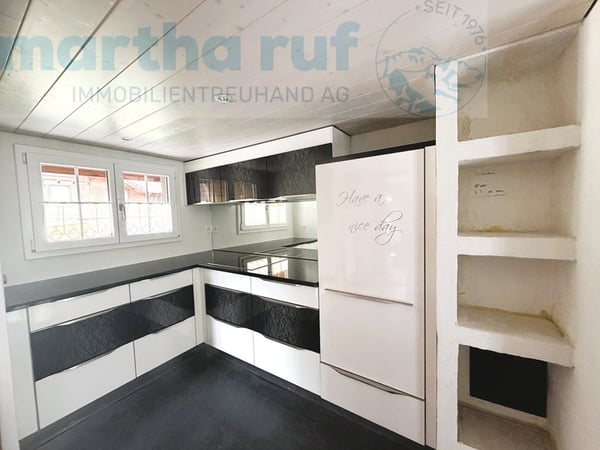 Traditionelles, angebautes Einfamilien-Ferienhaus mit alpinem Charm 5
