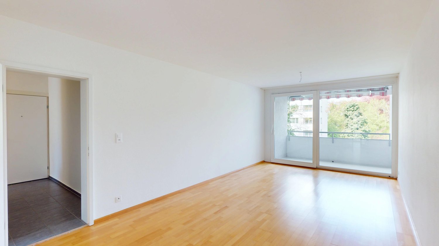 empty room, wooden floor, white walls, sliding glass doors, balcony