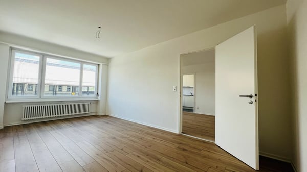Neuwertige 1.5-Zimmerwohnung mit Balkon und Keller direkt am Bahnhof (1053) 4