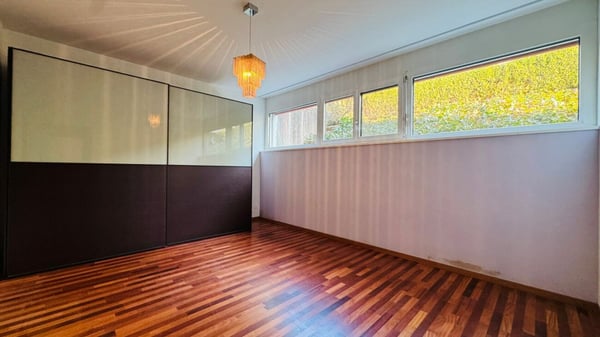 Gepflegte 5.5-Zimmer-Garten-Maisonettewohnung mit Wintergarten, Sitzplatz und Tiefgaragenplatz 7