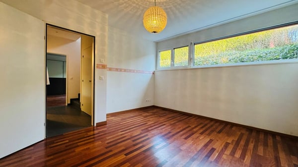 Gepflegte 5.5-Zimmer-Garten-Maisonettewohnung mit Wintergarten, Sitzplatz und Tiefgaragenplatz 8