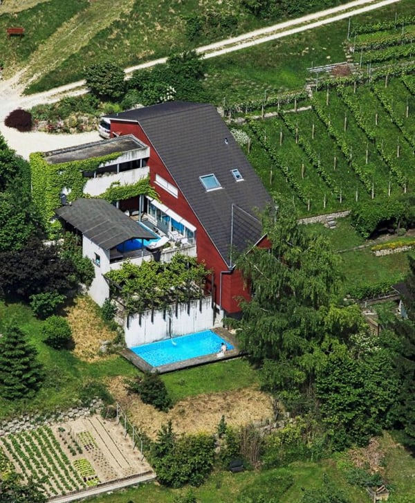 6.5-Zimmer-Architektenhaus mit Pool, Garagenbox, 3 Parkplätzen und Weitsicht 3