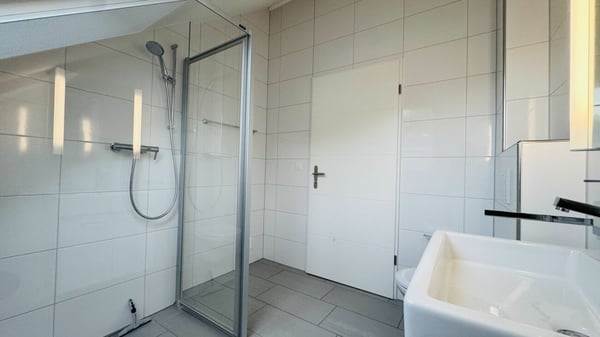 4.5-Zimmer-Maisonette mit Balkon, 2 Nasszellen, 2 Tiefgaragenplätzen, Waschturm und Keller 21