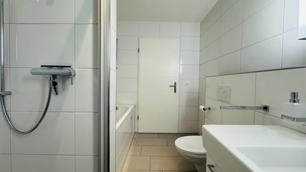 4.5-Zimmer-Maisonette mit Balkon, 2 Nasszellen, 2 Tiefgaragenplätzen, Waschturm und Keller 14