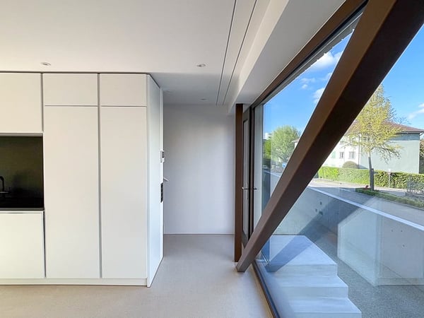 Hochmoderne Wohnung mit Hauscharakter und eigenem Gartenanteil in Bottmingen 7