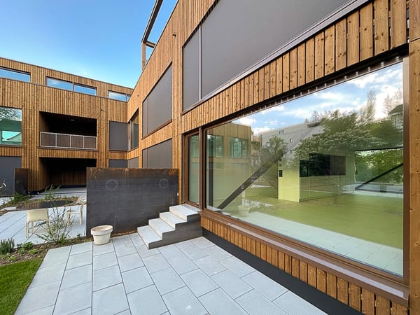 Hochmoderne Wohnung mit Hauscharakter und eigenem Gartenanteil in Bottmingen 6
