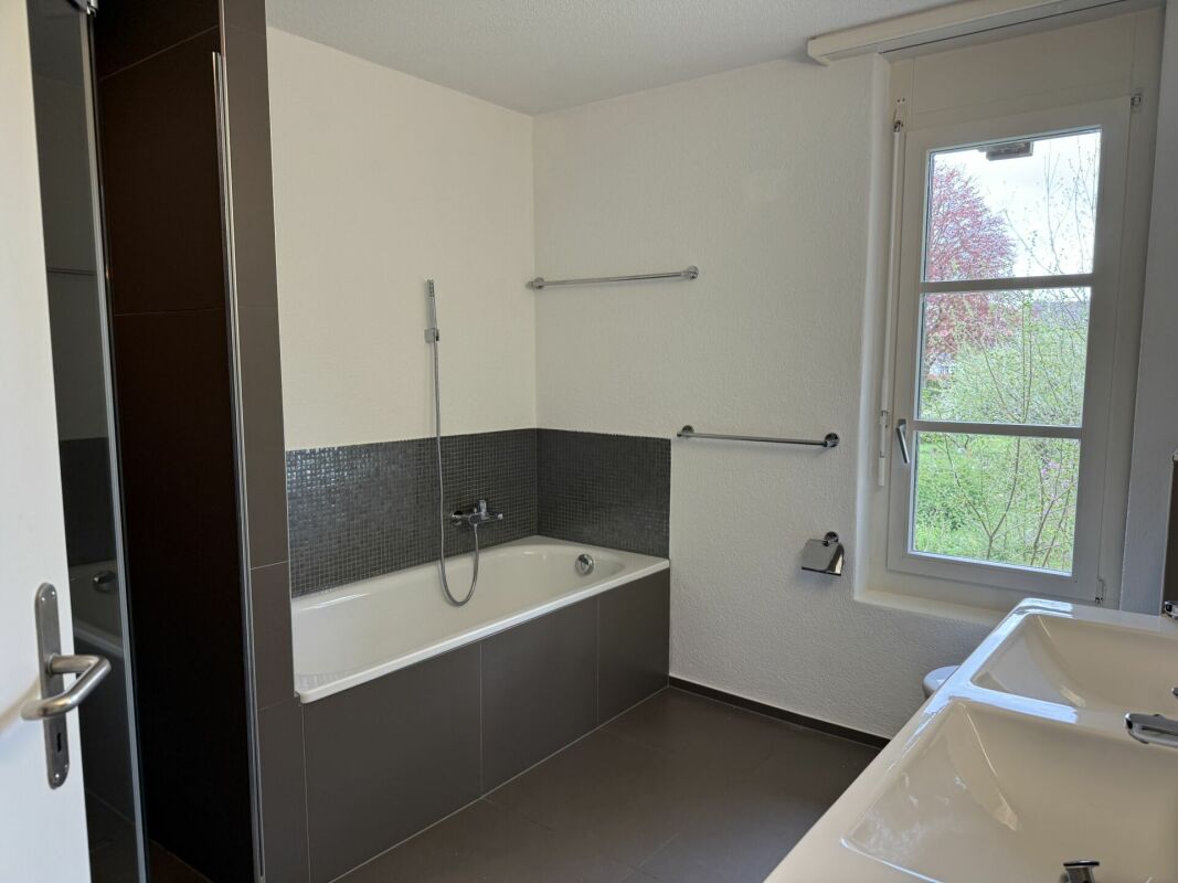 Top 8-Zimmer-Doppeleinfamilienhaus inkl. Dachwohnung