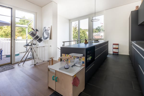 Urbanes Wohnen auf zwei Ebenen - grosszügige Maisonette-Attikawohnung 5