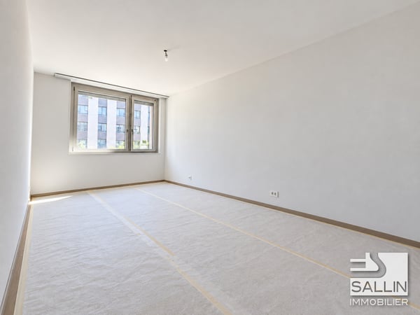 6 appartements neufs de 3½ pièces, avec parking, au centre ville 7