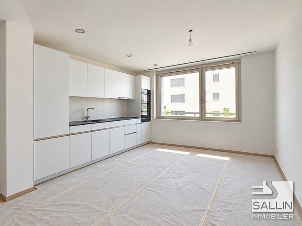 6 appartements neufs de 3½ pièces, avec parking, au centre ville 2