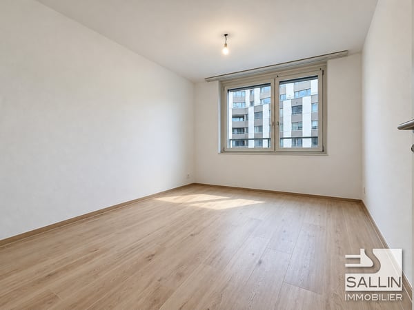 6 appartements neufs de 5½ pièces, avec parking, au centre ville 5