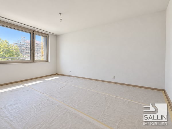 6 appartements neufs de 3½ pièces, avec parking, au centre ville 3