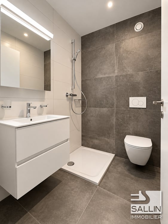6 appartements neufs de 5½ pièces, avec parking, au centre ville 8