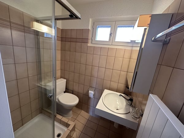 Familienfreundliche 4-Zimmerwohnung mit Gartensitzplatz 9
