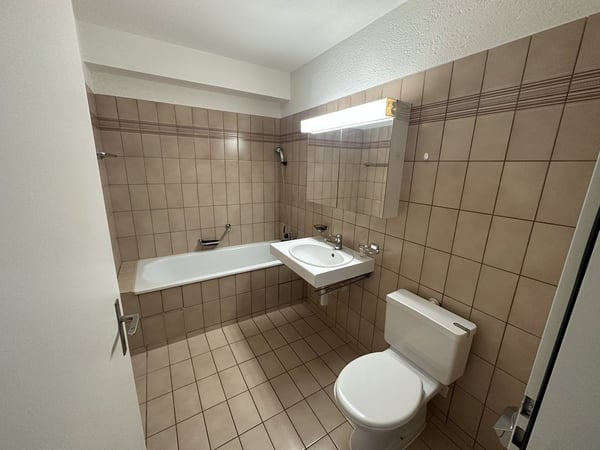 Familienfreundliche 4-Zimmerwohnung mit Gartensitzplatz 8