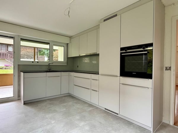 1.5-Zimmer-Parterrewohnung mit Wintergarten und Landanteil 3