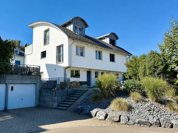 Grosszügiges 6.5-Zimmer-Doppeleinfamilienhaus mit Wintergarten an ruhiger und sonniger Wohnlage 1
