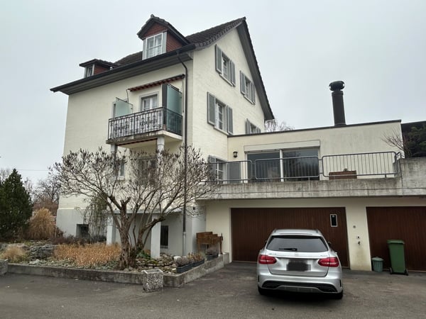 Charmantes Mehrfamilienhaus mit 3 Wohnungen in Regensdorf 1