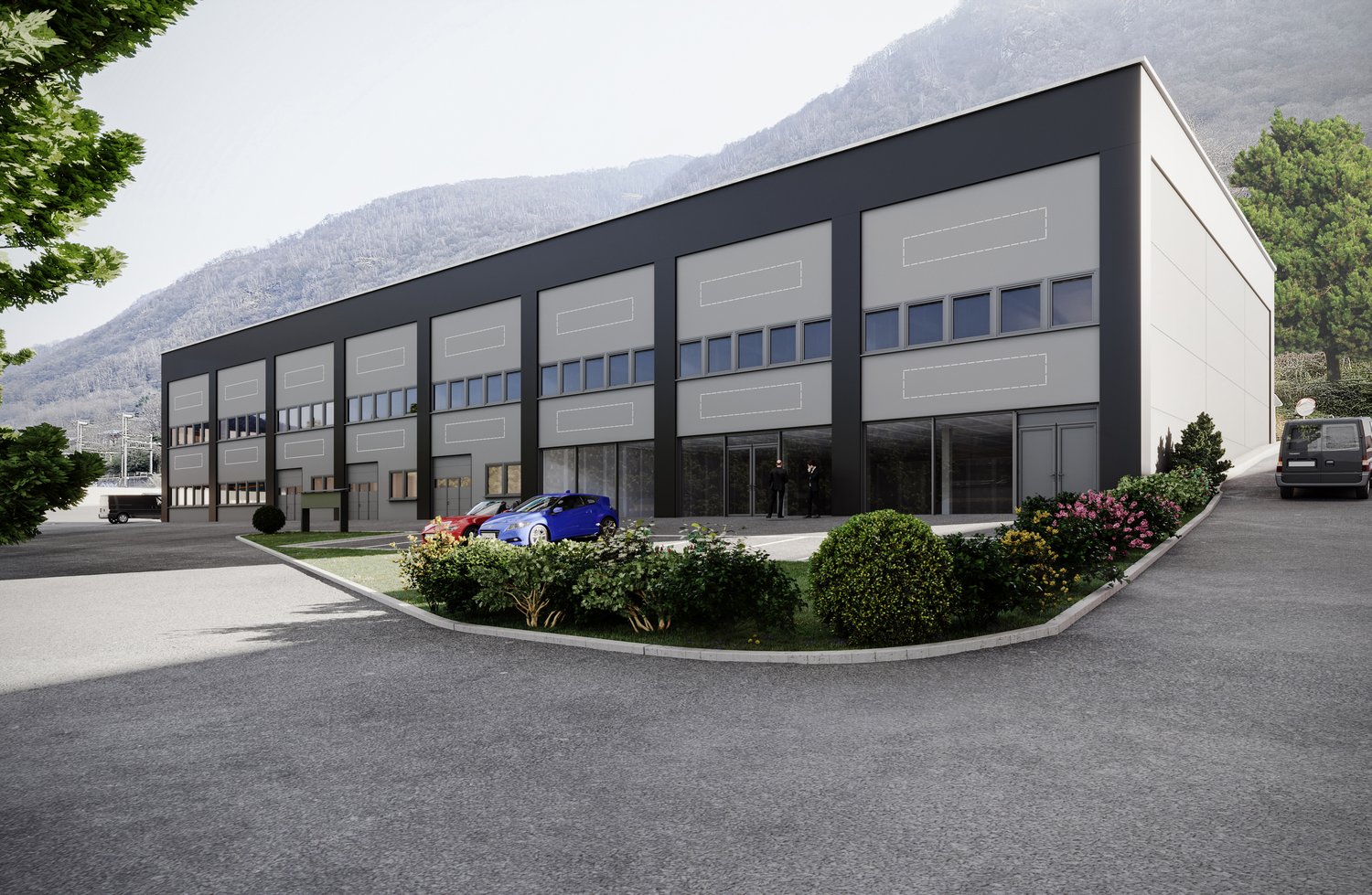 Modern warehouse, gray exterior, large windows, several parking spaces, landscape with shrubs and flowers, mountains in the background