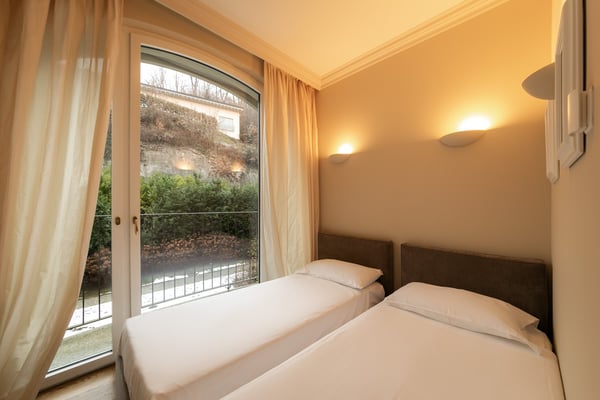 LUGANO-COLLINA D'ORO - AFFITTASI APPARTAMENTO ARREDATO CON SERVIZIO ALBERGHIERO (Rif. 406) 10