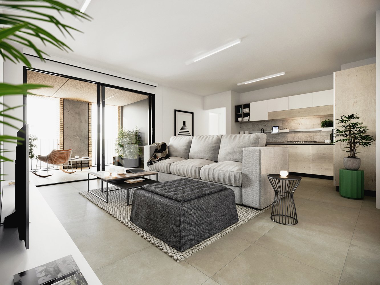 Spacious open-plan living room with large windows, grey sofa, coffee table, and modern kitchen area with white cabinets and concrete countertops. The room has a minimalist and contemporary design with a balcony or terrace visible through the windows.