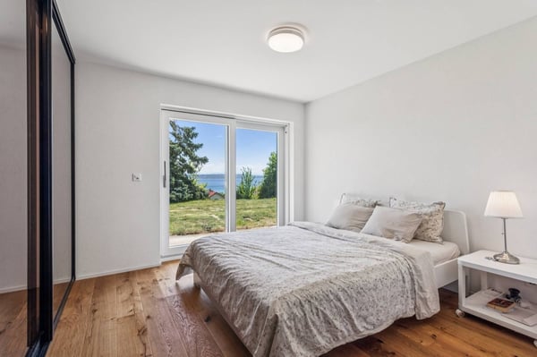 Une villa suspendue entre ciel, vignes et lac 7