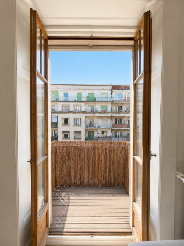 Appartement de caractère avec balcon au coeur de Genève