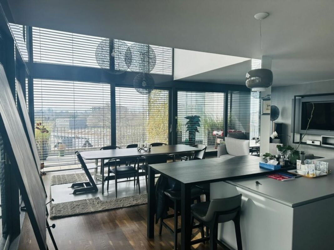 Triplex en attique style 