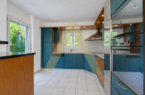 EPALINGES - UNE MAISON FAMILIALE AU COEUR DE LA VERDURE 3