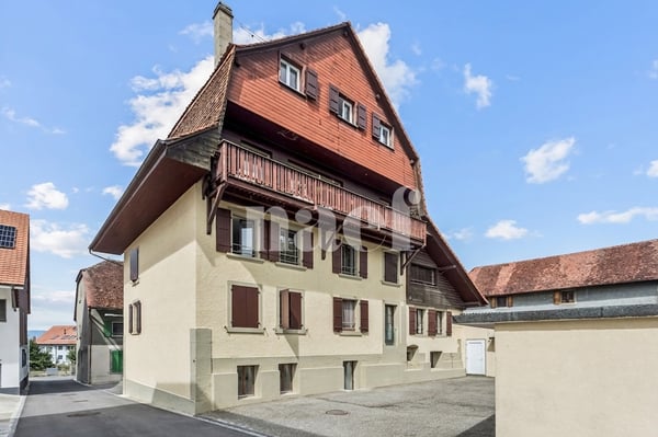 Immeuble locatif de 7 logements au centre du village à vendre à Corcelles-près-Payerne 2