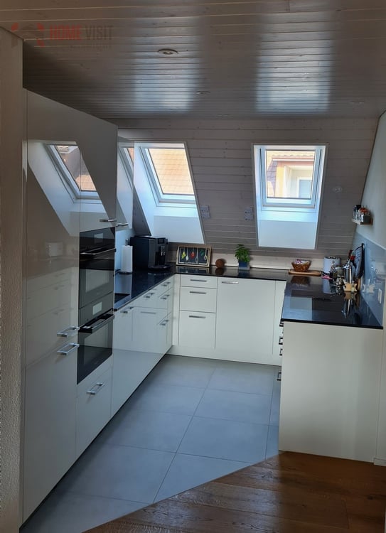 Moderne Dachwohnung mit Premium-Ausstattung & Ausbaupotenzial 3