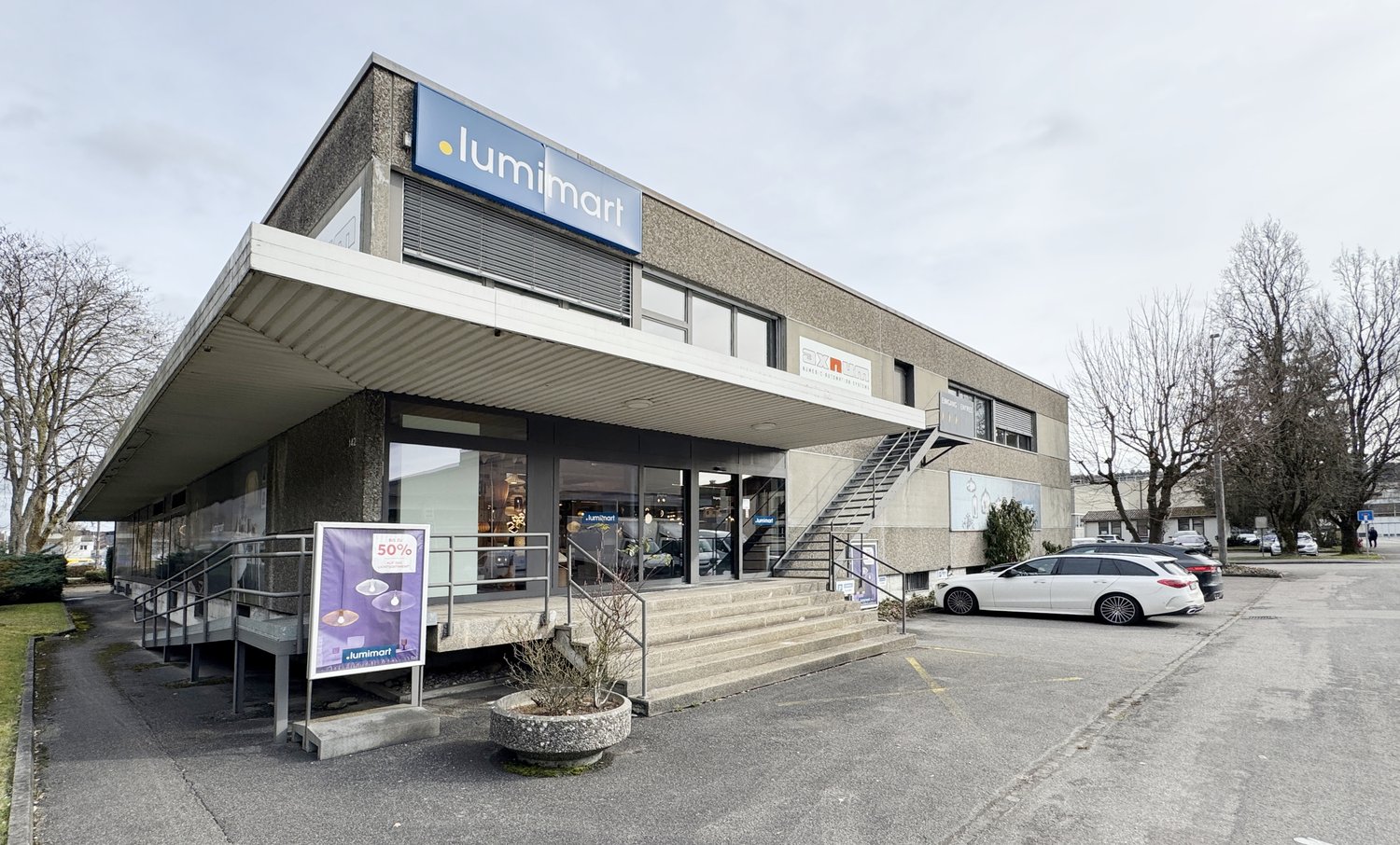 Storefront, Lumimart, entrance, staircases, parking, sign