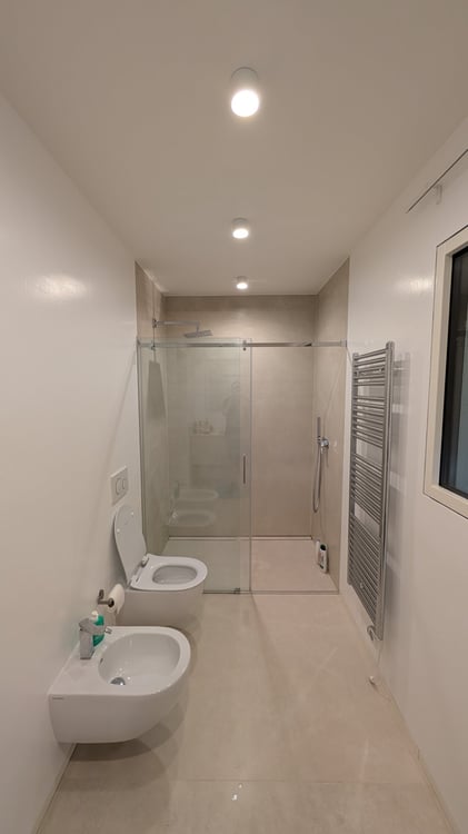 Moderno Appartamento 1.5 con Giardino, Terrazze e Piscina 5