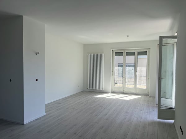 Luminoso attico 1.5 locali a nuovo con 2 balconi 3