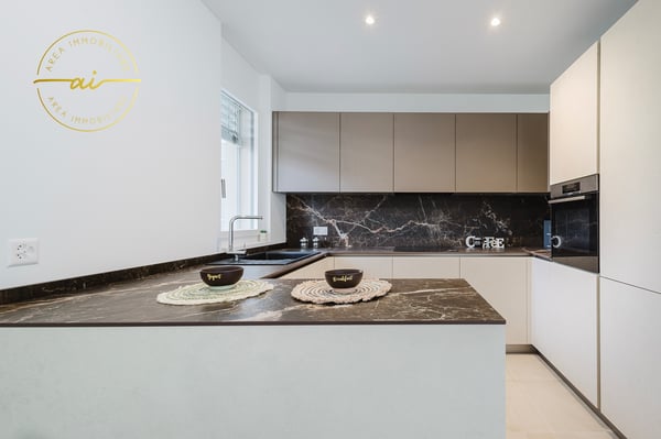 ELEGANTI APPARTAMENTI 1.5 LOCALI CON GIARDINO IN COSTRUZIONE 1