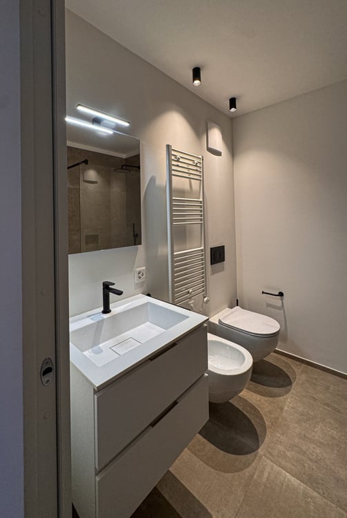 RAFFINATO APPARTAMENTO DI 1.5 LOCALI A MASSAGNO 9