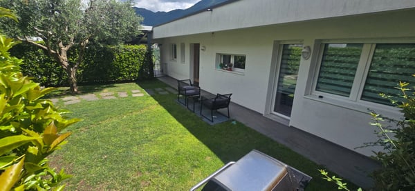 Splendido 3.5 locali a Porza con giardino privato,vista lago 2