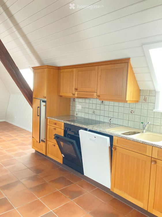 Heimelige Dachwohnung mit Gartensitzplatz 5