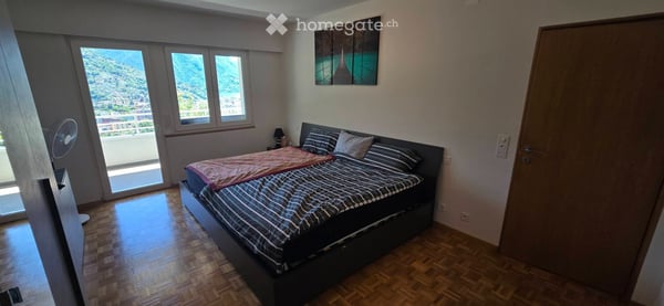 3.5 Locali - Giardino privato e terrazza vista lago a Porza 2
