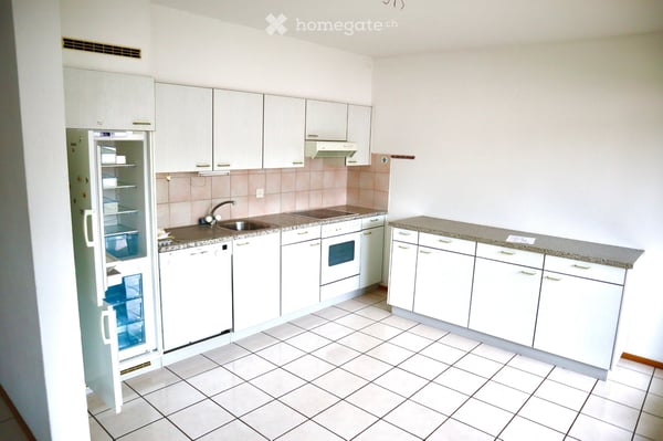 Luminoso bilocale di 71 m² con terrazza coperta 4