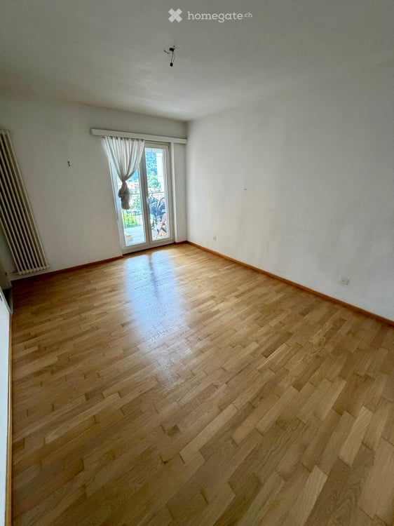 Vista lago Caslano 4.5 locali con posto auto e balconi 2